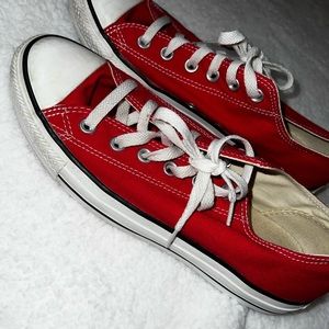 Red converse low tops